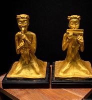 Front view of both gilt musician bookends on bases
