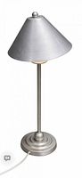 Full view of brushed metal table lamp showing shade, stem, base, cord
