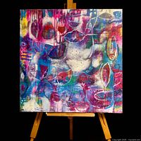 Front view of square acrylic painting on easel