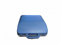 Blue hard-shell carrying case closed with handle visible