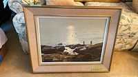 Front view of framed Alex McLaren seascape oil painting