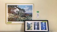Overall view showing both framed artworks: Paul Landry print and waterfall photo frame