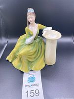 Front view of Royal Doulton Secret Thoughts figurine showing missing left hand