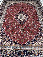 Full view of Kashan rug showing overall design and dimensions