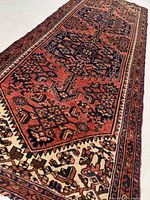 Angle view highlighting pile texture, colors and fringe