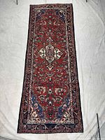 Full view of entire runner rug showing pattern and borders