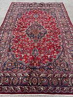 Full view of Mashhad red floral rug