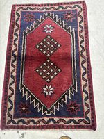 Front view of Shiraz wool rug showing full pattern and borders