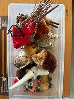 Top view of bin showing assorted animal ornaments