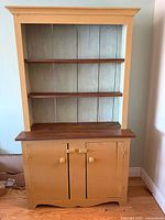 Full view of hutch front showing shelves, counter, base cabinet