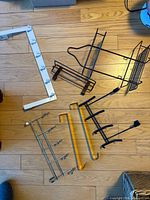 Group shot of six metal over-door organizers on floor