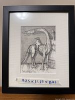 Framed etching with dimensions tape