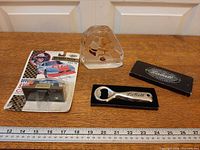 All three branded items with ruler for scale