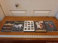 All five DVD cases lined up on table