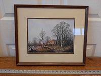 Full view of framed print with ruler for scale