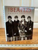 Front cover of hardcover book showing title and image of The Beatles