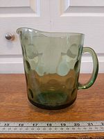 Side view showing full profile, handle, dot optic pattern