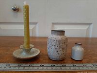 All four items aligned with ruler for scale