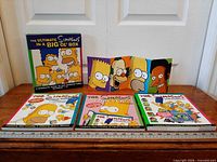 Front view of slipcase with three books displayed