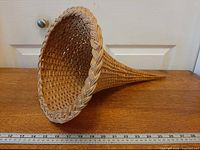 Basket opening showing braided rim and weave