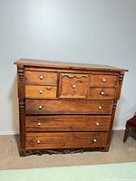 front view of dresser showing eight drawers and overall design
