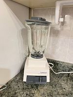 Full view of blender showing base, jar, lid and cord