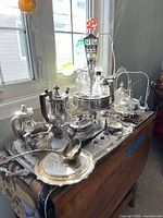 overview of all silverplate pieces on tray
