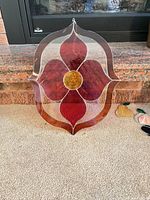 Large red floral stained glass panel