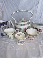 Group shot of all six porcelain items