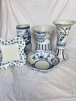 Group shot of all five porcelain/ceramic pieces