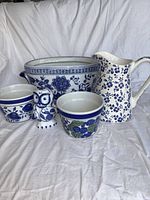 Group shot of all five blue and white ceramic pieces