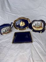 Group shot of all four Limoges cobalt pieces