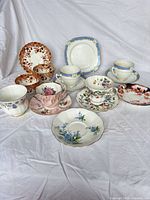 Full group shot of mixed tea china – shows all 14 pieces