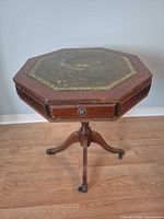 Full view of octagonal leather-inset side table