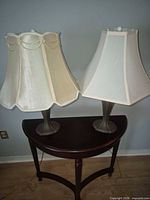 Both lamps showing differing shade styles and matching bases