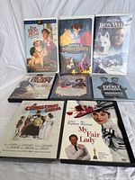 All eight tapes and discs front covers visible