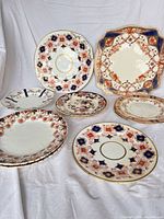 Group shot of assorted plates showing patterns and relative sizes