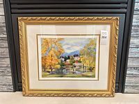 Full view of framed serigraph showing artwork, mat and frame