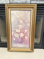 Front view of framed floral painting