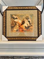 Front view of framed print with corner protectors