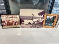 All three framed photographs together