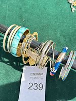 Group shot of all bracelets on display rod