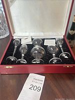 Boxed set of six miniature glasses in red presentation box