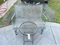 Front view of loveseat and side table