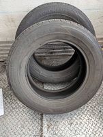 Both Yokohama tires side by side showing brand and overall condition