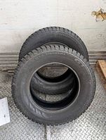 Stacked view of two Champiro Ice tires