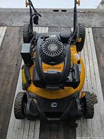 Full top view of Cub Cadet SC500H mower showing handle, wheels, deck and engine