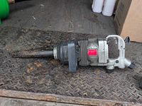 Full view of 1" air impact wrench on floor