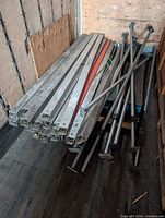 stacked square logistic bars and round load locks on trailer floor