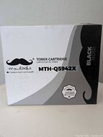 Front of Moustache toner cartridge box showing model and color